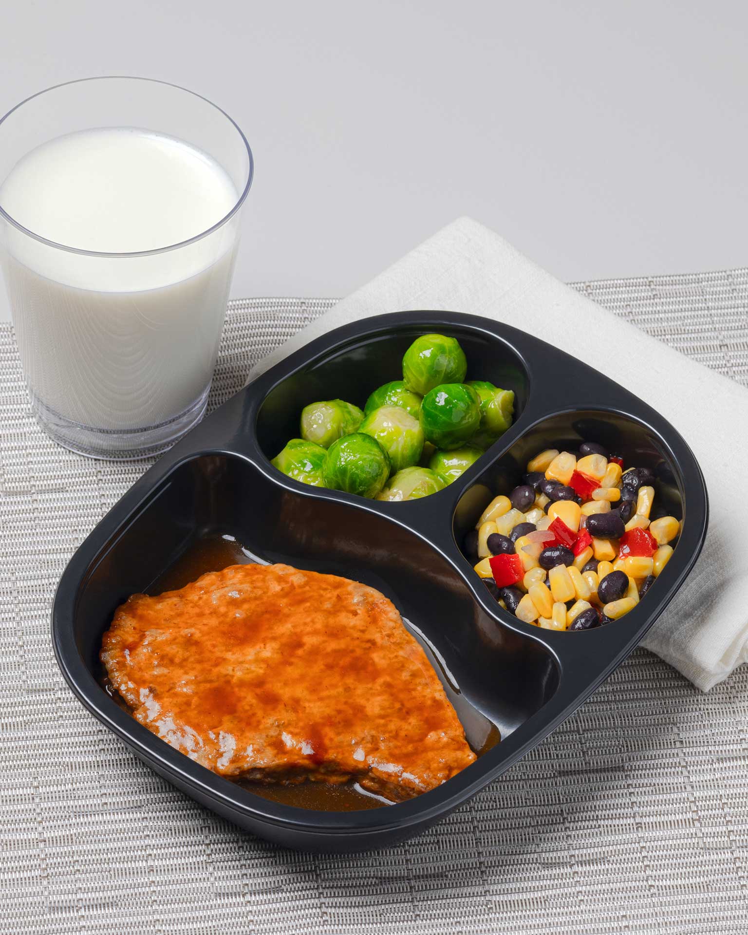 BBQ Pork Patty with Black Beans & Corn and Brussels Sprouts