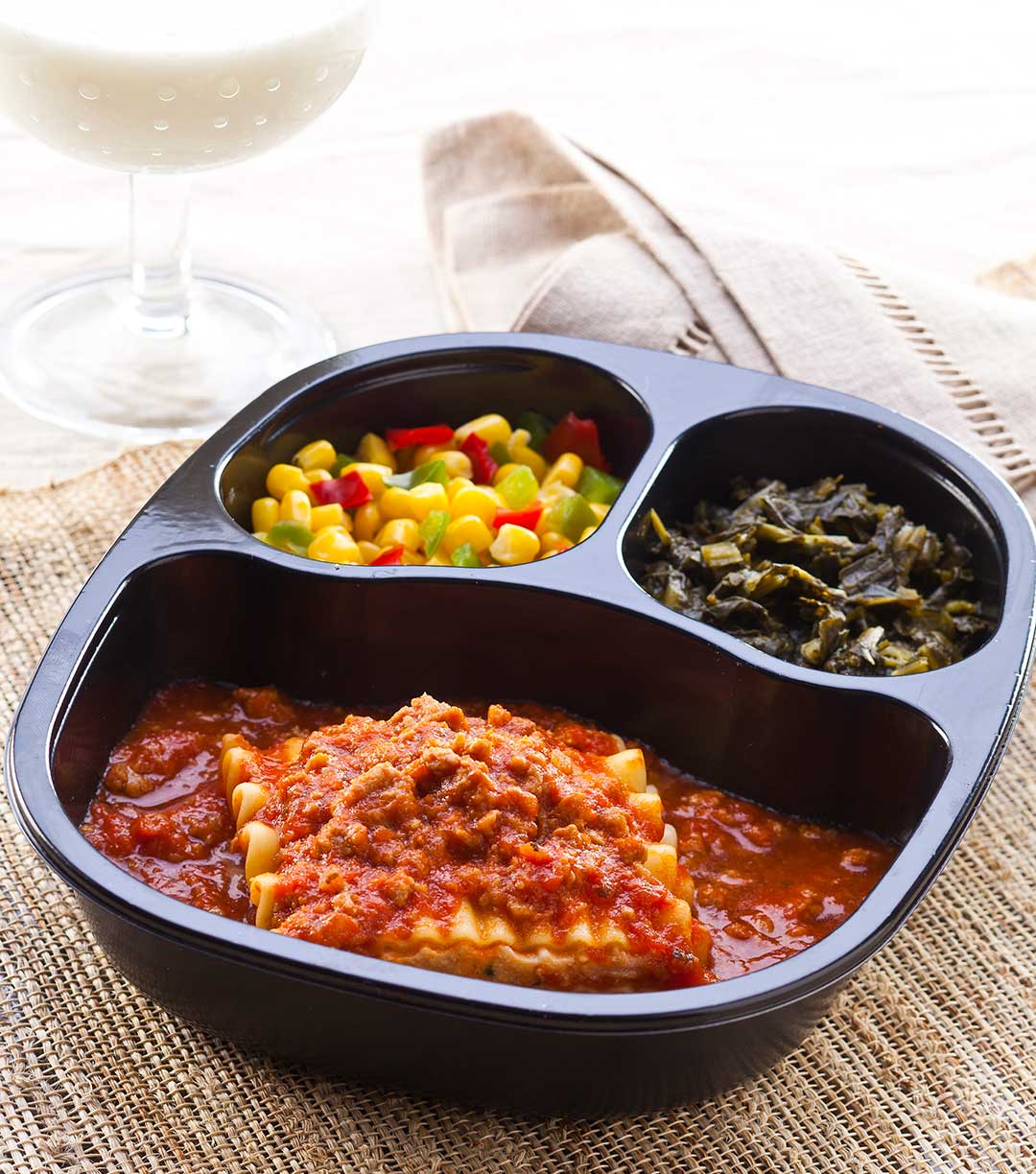 Lasagna with Meat Sauce, served with Spinach & Corn with Peppers