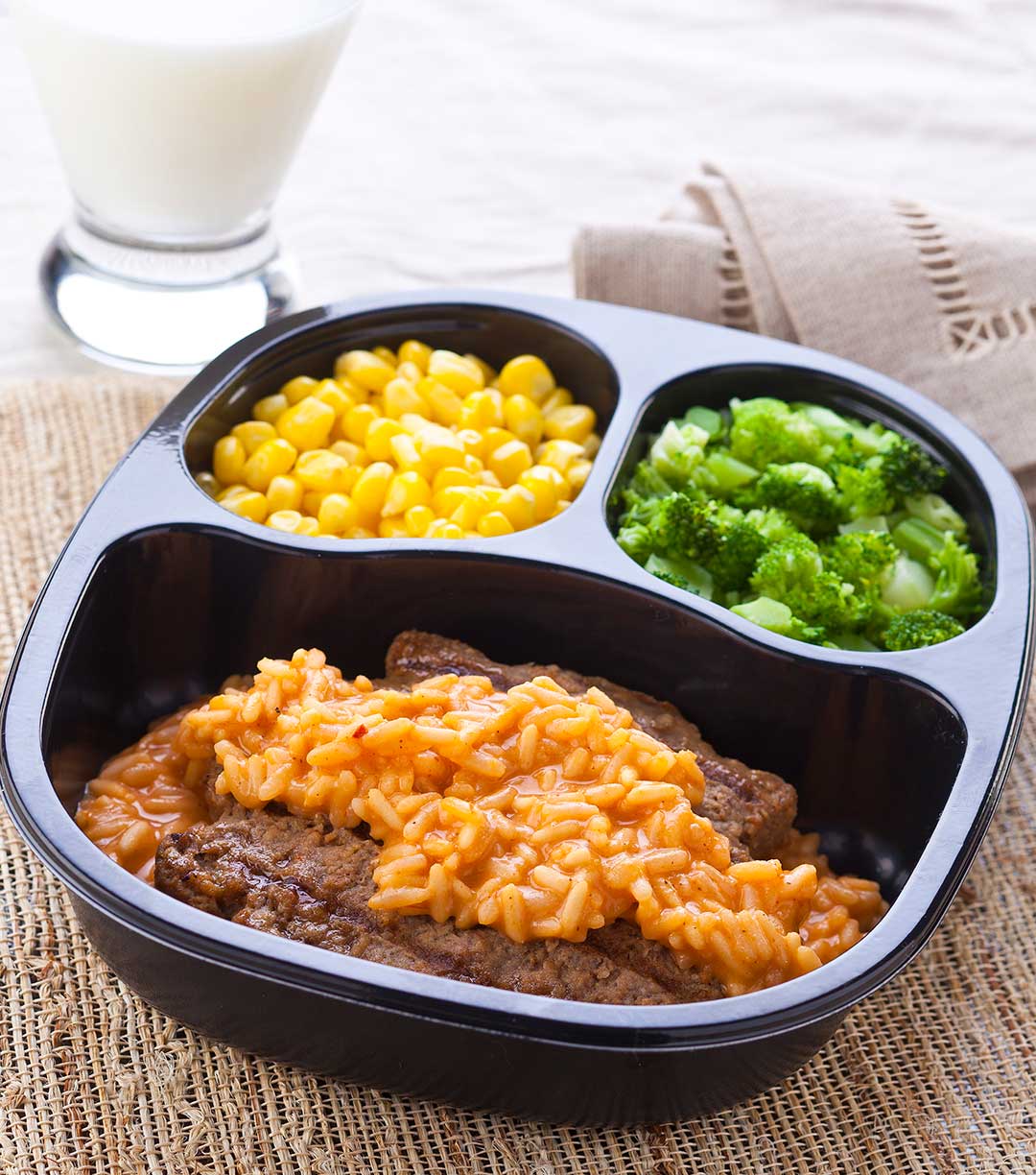 Beef Patty over Cheesy Chipotle Rice with Whole Kernel Corn & Broccoli Florets